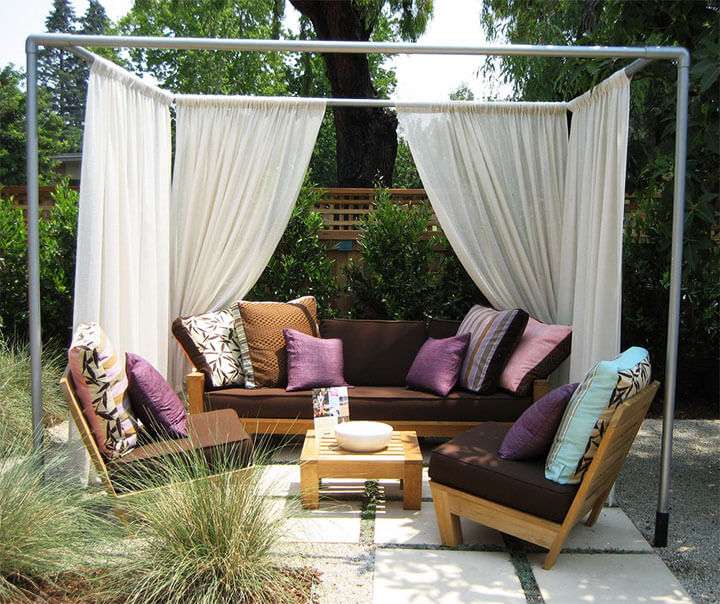 Использование штор для летней беседки